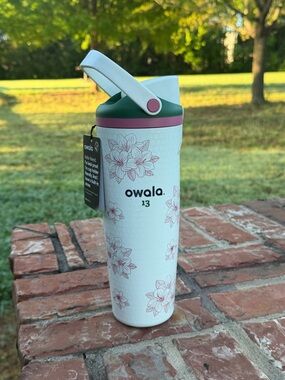 Owala 30oz Owala Travel Bottle in White with Pink & Green Accents Masters 2026